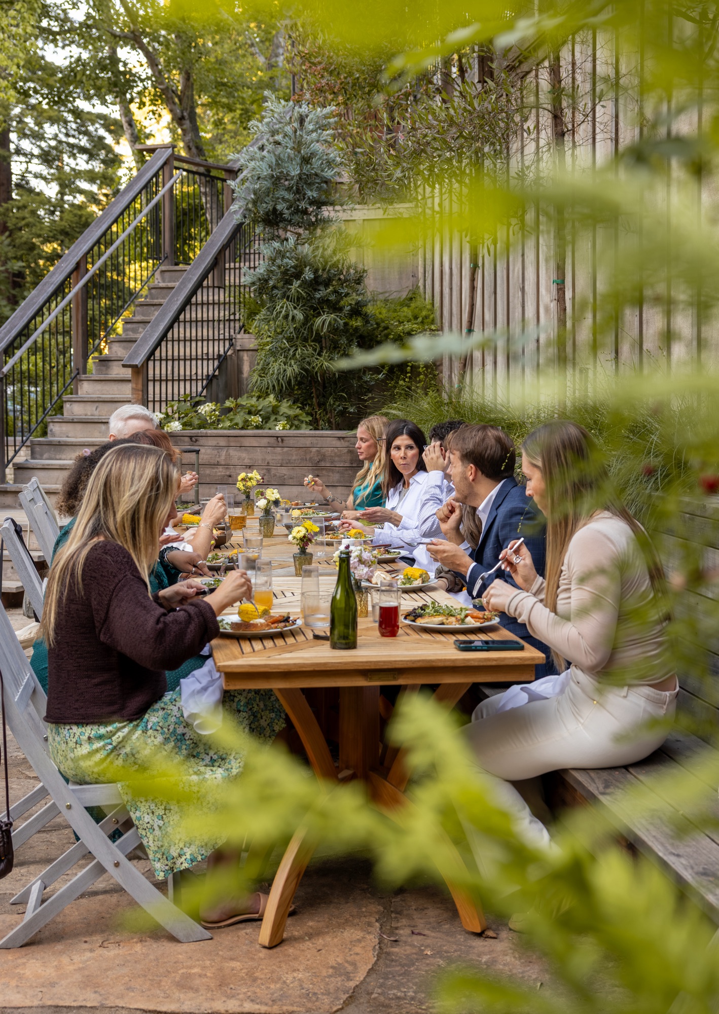 Team dinner under the redwoods at the 2026 Bash Creative retreat